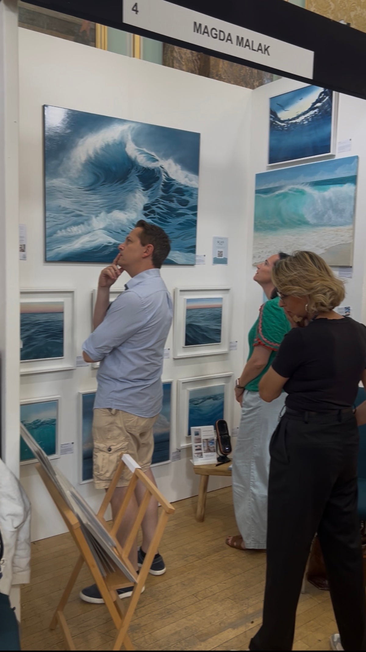 Magda Malak presenting her paintings at Untitled Artists Fair, London